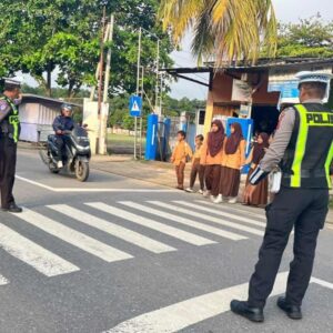 Satlantas Polres Bima Gelar Rawan Pagi dan Bantu Penyeberangan di SDN 01 Panda