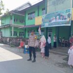 Polri Hadir di Tengah Masyarakat, Bhabinkamtibmas Desa Pelambik Amankan Zikir Akbar dan Atur Lalu Lintas