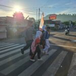 Polsek Rasanae Timur Laksanakan Rawan Pagi, Antisipasi Kemacetan dan Bantu Penyebrangan Pelajar