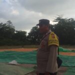 Bhabinkamtibmas Polsek Kilo Pantau Penjemuran Jagung Warga, Dukung Ketahanan Pangan Nasional