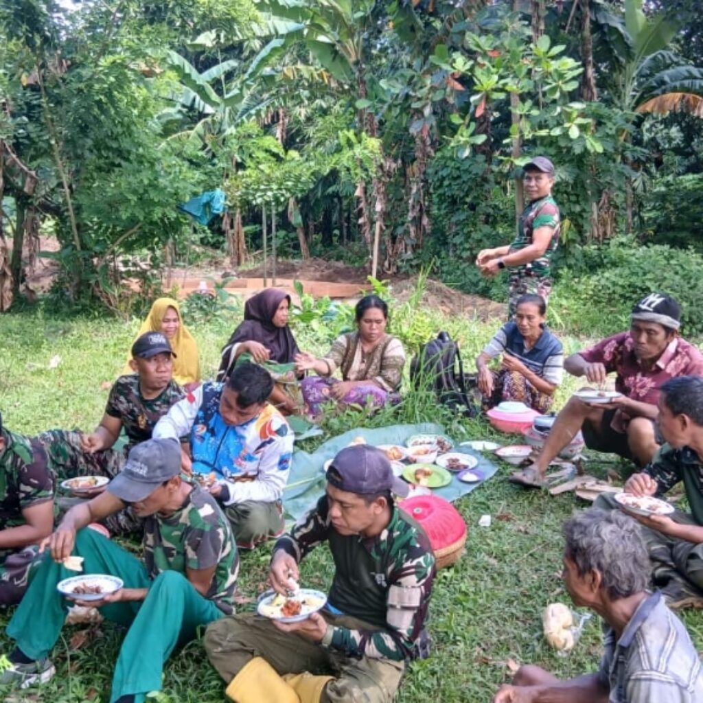 Hangatnya Kebersamaan Satgas dan Warga Bangun Jembatan Garuda