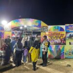 Bhabinkamtibmas Desa Ta’a Laksanakan Pengamanan Pasar Malam, Ajak Masyarakat Jaga Kamtibmas