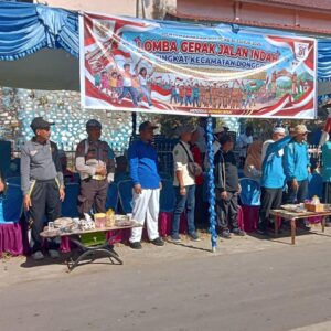 Meriahkan HUT Kemerdekaan RI Ke-81, Personel Polsek Donggo Gelar Pengamanan Gerak Jalan Indah Tingkat Kecamatan Donggo