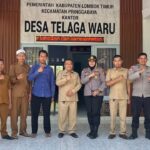Kapolsek Pringgabaya Jalin Silaturahmi dengan Pemerintah Desa Telaga Waru, Perkuat Sinergitas Jelang Pilkades