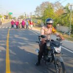 Polsek Empang Kawal Meriahnya Jalan Sehat HUT Desa Lamenta ke-22, Diikuti Ratusan Warga dan Senam Bersama